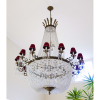 <p>impotante lustre de cristal baccarat, medindo 200cm de altura por 180 cm de diametro (aproximadamente)</p><br /><p>15 luzes</p>