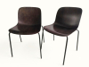 <p>Duas cadeiras Marcel Wanders, modelo Troy, de fabricação Magis. Estrutura com assento e encosto monobloco em madeira moldada, com decoração em relevo prensado no verso. base tubular com ponteiras originais. Marcada sob o assento com o timbre da manufatura - 47 x 50 x 80 cm alt - Made in Italy</p>