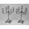 Par de candelabros estilo D . Joao V , decorado com rocalhas, prata de lei, marca do prateiro SEP,Altura: 37cm.Inicio sec. XX. 