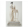 <p>Grupo escultórico de marfim finamente esculpido representando figura feminina alada por mesa e vaso, marca vermelha no verso. Alt. 37 x 20 x 10cm. China, séc. XIX /XX</p>