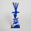 <p>RUBEM VALENTIM Torre Azul II Escultura em resina pintada a m&atilde;o. Med 19x7x7 cm -Assinada na matriz - Sem data, sem numera&ccedil;&atilde;o. Edi&ccedil;&atilde;o de 2.500 exemplares do Instituto R. Valentim. TORRE AZUL II Caracter&iacute;sticas Distintivas: Escultura em resina premium com pintura artesanal manual; Produto licenciado com autoriza&ccedil;&atilde;o oficial do estate do artista; Aprofundamento do di&aacute;logo entre concretismo e espiritualidade ancestral; Complexifica&ccedil;&atilde;o sofisticada dos s&iacute;mbolos geom&eacute;tricos dos orix&aacute;s; Varia&ccedil;&otilde;es tonais do azul evocando diferentes qualidades das &aacute;guas divinas; Ritmo visual que ecoa os toques sagrados dos atabaques; Transforma&ccedil;&atilde;o em partitura visual dos sons do candombl&eacute;; Eleva&ccedil;&atilde;o de s&iacute;mbolos religiosos ao status de arte conceitual; Inspirado na obra evolutiva &ldquo;Torre Azul II&rdquo; de Rubem Valentim; Partitura Visual e Ritmos dos Atabaques Sagrados. Evolu&ccedil;&atilde;o da S&iacute;ntese Entre Concretismo e Espiritualidade Afro-Brasileira: Quando um artista consegue evoluir uma linguagem visual j&aacute; revolucion&aacute;ria, o resultado transcende a simples progress&atilde;o para se tornar aprofundamento espiritual. Maturidade Art&iacute;stica e Legado Evolutivo: Esta recria&ccedil;&atilde;o tridimensional conta com a aprova&ccedil;&atilde;o oficial do estate de Rubem Valentim, garantindo n&atilde;o apenas a autenticidade da interpreta&ccedil;&atilde;o evolutiva, mas o reconhecimento da qualidade art&iacute;stica desta transposi&ccedil;&atilde;o dimensional. A obra representa a maturidade art&iacute;stica de um criador que conseguiu desenvolver e aprofundar sua linguagem visual mantendo absolute fidelidade aos princ&iacute;pios espirituais e culturais que a fundamentam. &ldquo;Torre Azul II&rdquo; de Rubem Valentim representa uma evolu&ccedil;&atilde;o natural da primeira torre, aprofundando o di&aacute;logo entre concretismo e espiritualidade afro-brasileira atrav&eacute;s de uma complexifica&ccedil;&atilde;o dos s&iacute;mbolos geom&eacute;tricos que transforma a obra em verdadeira partitura visual dos sons sagrados do candombl&eacute;. Complexifica&ccedil;&atilde;o Simb&oacute;lica e Evolu&ccedil;&atilde;o Espiritual: A obra apresenta uma complexifica&ccedil;&atilde;o deliberada dos s&iacute;mbolos geom&eacute;tricos dos orix&aacute;s, demonstrando como Rubem Valentim conseguiu aprofundar sua linguagem visual sem perder a conex&atilde;o com as tradi&ccedil;&otilde;es ancestrais. Esta evolu&ccedil;&atilde;o n&atilde;o &eacute; meramente formal, mas representa um amadurecimento espiritual que permite ao artista expressar nuances mais sutis da cosmologia afro-brasileira atrav&eacute;s da geometria sagrada. Cada elemento adicional na composi&ccedil;&atilde;o funciona como camada de significado que enriquece a leitura simb&oacute;lica da obra. A complexifica&ccedil;&atilde;o geom&eacute;trica espelha a riqueza e profundidade da tradi&ccedil;&atilde;o religiosa afro-brasileira, onde cada s&iacute;mbolo carrega m&uacute;ltiplas interpreta&ccedil;&otilde;es e conex&otilde;es com diferentes aspectos da experi&ecirc;ncia espiritual e cultural. &Aacute;guas Divinas e Varia&ccedil;&otilde;es Tonais Sagradas: Nossa interpreta&ccedil;&atilde;o escult&oacute;rica desta evolu&ccedil;&atilde;o art&iacute;stica nasceu do entendimento de que as poss&iacute;veis varia&ccedil;&otilde;es tonais do azul sagrado evocam diferentes qualidades das &aacute;guas divinas presentes na cosmologia afro-brasileira. Cada tonalidade conecta-se a aspectos espec&iacute;ficos dos orix&aacute;s aqu&aacute;ticos, criando uma experi&ecirc;ncia crom&aacute;tica que &eacute; simultaneamente visual e espiritual. O azul mant&eacute;m sua centralidade sagrada while se expande em possibilidades expressivas que refletem a diversidade das manifesta&ccedil;&otilde;es divinas nas &aacute;guas &ndash; desde as &aacute;guas doces de Oxum at&eacute; as &aacute;guas salgadas de Iemanj&aacute;, passando pelas &aacute;guas correntes que carregam mensagens ancestrais. Esta sofistica&ccedil;&atilde;o crom&aacute;tica demonstra a maturidade art&iacute;stica alcan&ccedil;ada por Valentim na explora&ccedil;&atilde;o de sua linguagem concretista sagrada. A genialidade de &ldquo;Torre Azul II&rdquo; reside na capacidade de transformar elementos visuais em experi&ecirc;ncia sonora sinest&eacute;sica. Com ritmo visual que ecoa os toques dos atabaques, esta torre funciona como partitura visual dos sons sagrados do candombl&eacute;, criando uma ponte entre diferentes linguagens art&iacute;sticas que amplifica o impacto espiritual da obra. Esta dimens&atilde;o r&iacute;tmica visual n&atilde;o &eacute; metaf&oacute;rica, mas estrutural &ndash; os elementos geom&eacute;tricos se organizam seguindo padr&otilde;es que espelham as cad&ecirc;ncias musicais dos rituais afro-brasileiros. A obra consegue assim capturar n&atilde;o apenas os s&iacute;mbolos visuais, mas tamb&eacute;m a musicalidade e temporalidade ritual, criando uma experi&ecirc;ncia art&iacute;stica total que honra m&uacute;ltiplas dimens&otilde;es da tradi&ccedil;&atilde;o ancestral. Reafirma&ccedil;&atilde;o Cultural e Sofistica&ccedil;&atilde;o Conceitual: &ldquo;Torre Azul II&rdquo; reafirma de forma ainda mais enf&aacute;tica a presen&ccedil;a da cultura afro-brasileira no circuito art&iacute;stico contempor&acirc;neo, demonstrando como a evolu&ccedil;&atilde;o art&iacute;stica pode aprofundar rather than abandonar conex&otilde;es culturais fundamentais. A obra eleva s&iacute;mbolos religiosos ao status de arte conceitual sofisticada atrav&eacute;s da for&ccedil;a transformadora do Ax&eacute;, provando que tradi&ccedil;&atilde;o e vanguarda podem coexistir e se potencializar mutuamente. Esta segunda torre representa n&atilde;o apenas continuidade, mas evolu&ccedil;&atilde;o consciente &ndash; uma demonstra&ccedil;&atilde;o de como artistas podem desenvolver linguagens visuais pr&oacute;prias sem perder suas ra&iacute;zes culturais. Possuir esta obra significa participar de um movimento art&iacute;stico que reconhece a sofistica&ccedil;&atilde;o intelectual e espiritual das tradi&ccedil;&otilde;es afro-brasileiras como fonte leg&iacute;tima de inova&ccedil;&atilde;o est&eacute;tica contempor&acirc;nea. Maturidade Art&iacute;stica e Legado Evolutivo: Esta recria&ccedil;&atilde;o tridimensional conta com a aprova&ccedil;&atilde;o oficial do estate de Rubem Valentim, garantindo n&atilde;o apenas a autenticidade da interpreta&ccedil;&atilde;o evolutiva, mas o reconhecimento da qualidade art&iacute;stica desta transposi&ccedil;&atilde;o dimensional. A obra representa a maturidade art&iacute;stica de um criador que conseguiu desenvolver e aprofundar sua linguagem visual mantendo absolute fidelidade aos princ&iacute;pios espirituais e culturais que a fundamentam. Para o colecionador de arte conceitual brasileira, &ldquo;Torre Azul II&rdquo; representa investimento em uma obra que demonstra como a evolu&ccedil;&atilde;o art&iacute;stica verdadeira aprofunda rather than abandona conex&otilde;es fundamentais. &Eacute; uma pe&ccedil;a que celebra simultaneamente a inova&ccedil;&atilde;o formal e a fidelidade cultural, consolidando-se como exemplo paradigm&aacute;tico de como artistas brasileiros podem contribuir para a vanguarda internacional while honrando e desenvolvendo tradi&ccedil;&otilde;es nacionais &uacute;nicas).</p>