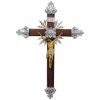 Crucifixo com cristo em madeira, do Séc. XIX. Adereços em prata cinzelada em flores, folhas e volutas. Alt. crucifixo 73cm e Alt. Cristo 26cm.