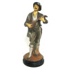 Antiga e bela escultura européia em terracota policromada, representando Musicista. Apresenta marca da manufatura e numeração em crivo na base. Alt. 44cm.