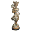 A. Moreau - Escultura francesa em petit bronze, representando Menina com guarda sol. Base em madeira. Artista catalogado em diversos livros e de cotação internacional. Alt. 38,5cm.
