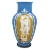 Belo vaso em opalina francesa de Sévres, do Séc. XIX, na cor azul e leitosa, decorada com pintura em dourado e tendo em reserva cena de Madona com Puttino. Apresenta na base os dizeres: Sévres 1880. (com pequena perda no dourado). Alt. 36cm. 