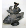 Escultura em barro cozido e patinado, possivelmente Pré-colombiana, na forma de peixe mitológico, tendo como função funerária da sorte. Apresenta pequenas perdas. Alt. 19,5 cm