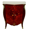 Belo dunquerque estilo francês, do séc. XIX, em madeira nobre marchetada com flores, folhagens e volutas, formado por 2 portas bombée, tendo no interior uma prateleira. Guarnições em bronze trabalhado. Tampo encimado por vidro (com pequeno bicado). Med. 91x71,5x41cm. 