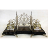 Raro e antigo tinteiro português, estilo neogótico em prata contrastada, Javali 2° título. Dois recipientes em grosso cristal. Base em jacarandá entalhado. (1 tinteiro com bicados). Med. 18x39x19,5cm.