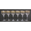 Seis belas taças em cristal francês da Cristallerie St. Louis para vinho tinto, decoradas com guirlandas em dourado e lapidações de flores e folhas em satiné. Alt. 17cm. 