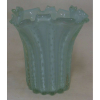 Vaso em murano italiano, anos 50, na cor verde água, trabalhado em gomos e decorado internamente com bolhas de ar. Borda recortada. Alt. 25cm. 