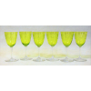 Baccarat - doze taças em cristal francês, com a marca da Cristallerie na base, na tonalidade verde com lapidações em guirlandas e frisos em satiné. Alt. 13,5 cm. 