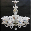 Belo lustre para 8 luzes em vidro opalinado, na cor leitosa com pintura floral em policromia. Bobeches e cúpulas com babados. Alt. 84 cm.