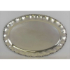 Bandeja ovalada em prata mexicana Sterling 925 milésimos. Borda com trabalhos em volutas e folhagens. Peso 1.285g. Med. 48x34cm.