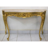 Console estilo Luis XV, em madeira dourada e entalhada com vazados. Tampo recortado em mármore. Med. 81x122x36cm. 