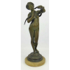 Ward Herbert - Escola Inglesa - Escultura art-deco em bronze representando Nu encantadora de serpente. Base em mármore. Artista catalogado no Benezit. Alt. total 34,5cm.