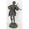 Emile Bruchon (1880-1910) - Escultura em petit bronze, francesa, representando Mozart. Apresenta selo de fundição e placa com título e nome do artista Bruchon. Base em mármore. Petit bronze com marcas do tempo e braço do violino com colagem. Alt. total 42cm. 