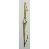 Elegante relógio de pulso feminino, Classic - 17 rubis, em ouro com marca do teor 720 (18K). Mostrador circundado com brilhantes. Máquina necessita regulagem. Peso total: 19,9 g. Compr. 17,5cm.
