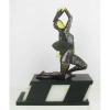 Escultura em bronze e pasta dura, ao gosto Chiparus, representando Dançarina com leque. Base em mármore de dois tons. Um dedo de uma mão quebrado e base com pequenas fissuras. Med. total 55x42,5x15cm.