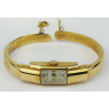 Relógio feminino Mondaine, em ouro contrastado, teor 750-18k, com fecho de segurança. Pequena solda e mossa na pulseira. Peso total 13,2 g. Este item não se encontra no local do leilão.