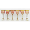 Seis belas taças em cristal tcheco, no tom doublet rosa e translúcido, decoradas com ricos detalhes em dourado. Alts. 17,5cm.