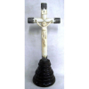 Cruz com cristo em marfim, cruz em montagem européia de época. Socle e terminais em prata cinzelada. Base em madeira. Alt. do crucifixo 34,5cm. Alt. total 49,5cm.