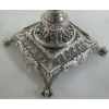 Paliteiro em prata portuguesa, pseudo contraste do Porto, prateiro F. D. G, meados do Séc. XIX, na forma de índio sobre coluna. Alt. 17cm. (parece que falta algo na mão).