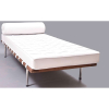 LUDWIG MIES VAN DER ROHE<br />CHAISE BARCELONA <br />Couro sob estrutura de madeira com pés em inox.<br />Medidas: 180 x 80 x 40 cm.<br /><br />A Cadeira Barcelona é do período de seu projeto mais famoso: o Pavilhão Francês da Feira Universal de Barcelona. O pavilhão foi reconstruído na década de 1990, como símbolo do modernismo em homenagem à Mies van der Rohe.<br /><br />Foi professor da Bauhaus e um dos criadores do que ficou conhecido por International Style, onde deixou a marca de uma arquitetura que prima pelo racionalismo, pela utilização de uma geometria clara e pela sofisticação<br /> <br />Modernista, Ludwig Mies van der Rohe, projetou o pavilhão alemão na Exposição Internacional de Barcelona em 1929.Sem precedentes, usou materiais da era industrial elevando-os ao nível de arte nunca antes alcançado. No interior, para o Rei e Rainha da Espanha, Mies incluiu cadeiras e bancos como um lugar de descanso.<br /><br />Ludwig Mies van der Rohe, nasceu na Alemanha, em 1886 e faleceu nos Estados Unidos, em 1969. <br />Arquiteto alemão, foi um dos principais nomes do século XX, colocado ao nível de Le Corbusier. 