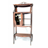 <p>ART NOUVEAU - FRANCE c. 1900. ETAGERE espelhada, móvel expositor, vitrine. Em madeira nobre, com entalhes sinuosos. Espelho original em cristal bisotée. Gabinete com aplicação de Madrepérola e pintura na porta, inspiração fitomorfa geometrizada. Puxador original em bronze. Três platôs e uma peanha intermediária sustentada por mão francesa. Cimalha vazada, entalhada no estilo Belle Époque. Medidas: 155 x 74 x 31 cm.</p>