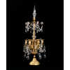 <p>BACCARAT- GIRANDOLE À PAMPILLES(LUSTRE DE MESA COM PINGENTES), França século XIX. Para seis velas, montado em bronze, recentemente polido. Excepcional qualidade de cinzelamento, decorado com caneluras, folhagens e perolados. Apresenta duas colunatas intermediárias, obelisco lanceforme, dois tipos de pingentes, rosetas e contas em cristal lapidado. Medidas: 71 x 24 x 24 cm.</p>