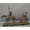 ALLIOT - (Lucien Charles E. Alliot, French 1877 - 1967)<br />Escultura Dom Quixote e Sancho Pança, bronze criselefantino, base em mármore verde.<br />Medidas: 37 x 57 x 10 cm. <br /><br />BIOGRAFIA: Aluno de Barrias e Coutan na Escola de Belas Artes de Paris, expôs regularmente no Salon des Artistes Français: terceira medalha e bolsa de viagem em 1907, membro e medalha de ouro em 1920, fora de competição e membro do júri de escultura de 1934 a 1939.<br />