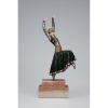 CHIPARUS, Demetre<br> Vested Dancer. Escultura de bronze e marfim sobre base de ônix. 55 cm de altura.Assinada na base.<br>França, c. 1930.<br><i>Reproduzida de página inteira em Chiparus Master of Art Deco, de Alberto Shayo à pág. 111; em Art Deco and Other Figures, de Bryan Catley à pág. 73; em Art Deco Sculture, de Victor Arwas, à pág. 41.</i>