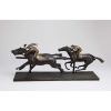 GUIRAUD RIVIÈRE<br> End of the Race. Escultura de bronze e marfim, sobre base de bronze. Assinada na base.<br> 74,5 x 20,5 x 31 cm de alt.<br>França, c. 1930.<br> <br><i>Reproduzida em Art Deco and Other Figures, de Bryan Catley, à pág. 172.</i>