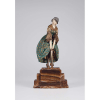 CHIPARUS, Demetre<br> A Slight Accident. Escultura de bronze patinado e marfim sobre base de ônix. 40 cm de altura. Assinada na base. França, c. 1930.<br> <br><i>Reproduzida em Master of Art Deco, de Alberto Sahayo, à pág. 73; em Art Deco and Other Figures, de Bryan Catley, à pág. 72.</i>