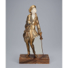 FARKAS, G.<br>A esgrimista. Escultura de bronze e marfim, sobre base de mármore.<br>Assinada no bronze.<br>35 cm de altura.<br>França, c. 1930. 