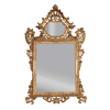 Magnífico e raro espelho com moldura de madeira, inspiração barroca, dourada, partes em ouro brunido encimado por cornija em forma de concha e espelhada. 187 cm de altura x 115 cm de largura. França, séc. XVIII.