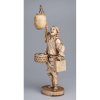 Escultura de marfim, figura portando balaio, caixa e luminária. 32 cm de altura. Assinada sob a base. Japão, séc. XIX.