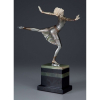 PREISS, Ferdinand<br />The Skater. Escultura de bronze patinado e marfim, sobre base de mármore e ônix. 34,5 cm de altura. Assinada no bronze. França, c. 1930.Reproduzida em Art Deco Sculptor, de Alberto Shayo, na página 151 e em Art Deco and Other Figures, de Bryan Catley, na página 289.