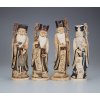 Conjunto de quatro esculturas de marfim - policromado, provavelmente imortais. - 38 cm de altura, o maior. Assinados sobre - selo vermelho. Japão, séc. XIX.