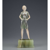 PREISS, Ferdinand - Gamine. Escultura de bronze e marfim, sobre base de ônix. 24,5 cm de altura. Assinada na base e monogramada no bronze. - França, c. 1930. - Este modelo ilustra a capa do livro. Art Deco Sculptor, de Alberto Shayo e está reproduzido na pág. 181, também em Art Deco and Other Figures, de Bryan Catley, à pág. 260.