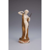 PREISS, Ferdinand<br>Vanity. <br>Escultura de bronze dourado e marfim, sobre base de mármore. <br>22 cm de altura. Assinada no bronze. <br>França, c. 1930.<br><br><em>Reproduzida em Art Deco Sculptor, de Alberto Shayo, na página 110; em Art Deco and Other Figures, de Bryan Catley, na página 286.</em><br>