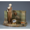 PREISS, Ferdinand<br>The Spring. Escultura de bronze e marfim, base de ônix, apresenta relógio acoplado em sua base. 31,5 x 19,5 x 28 cm de altura. França, c. 1930.<br /><br />Esta é a própria peça que encontra-se reproduzida no livro Art Deco and other Figures, de Bryan Catley, 1a. edição, à pág. 259.<br />Reproduzida também em Art Deco Sculptor, de Alberto Shayo à pág. 118.