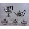 Elegante aparelho de chá e café composto por 5 peças de prata de lei ,contraste referente a Porto . Portugal Sec XIX.(2 peças no estado)