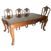 Sala de jantar de madeira lustrada, tendo a mesa duas tábuas de extensão e dez cadeiras( altura 111cm) com estofamento bege sendo duas de braços(altura 127cm) - estilo frances - mesa com 190cm de comprimento, 116 de largura e 80cm de altura