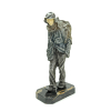 CHIPARUS, Demétre Haralamb (1886–1947) – “Rag-and-bone man” – Raríssima escultura em bronze patinado e marfim representando figura de andarilho sobre base de mármore Nero Portoro. Assinada na base, D. H. Chiparus – C. 1920 - 40 cm de altura - Reproduzida em : Art Deco and Other Figrures, de Bryan Catley, à pág. 65 / “Antique Collectors Club”, de Woodbridge, Inglaterra, 2003, à pág. 60 