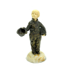 CHIPARUS, Demétre Haralamb (1886–1947) – “ Little Beggar “ - Escultura em bronze patinado e marfim representando criança sobre base de mármore. Assinada na base, D. H. Chiparus – C. 1920 - 23 cm de altura - Reproduzida em Art Deco and Other Figrures, de Bryan Catley, à pág. 67. 